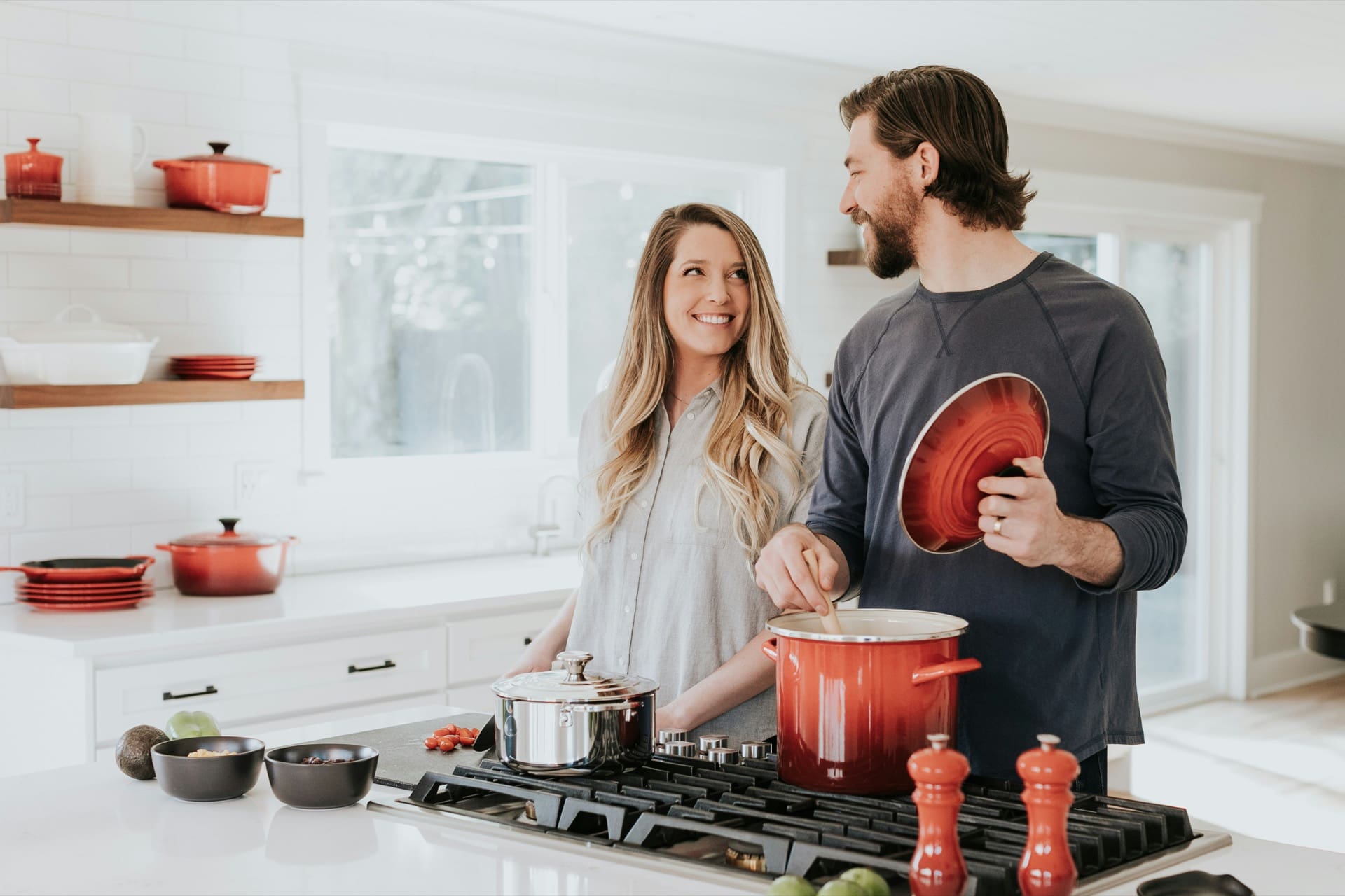 Happy Mechanicsburg couple enjoying a newly remodeled kitchen from Reinert Brothers